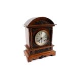 A Victorian eight-day oak mantel clock