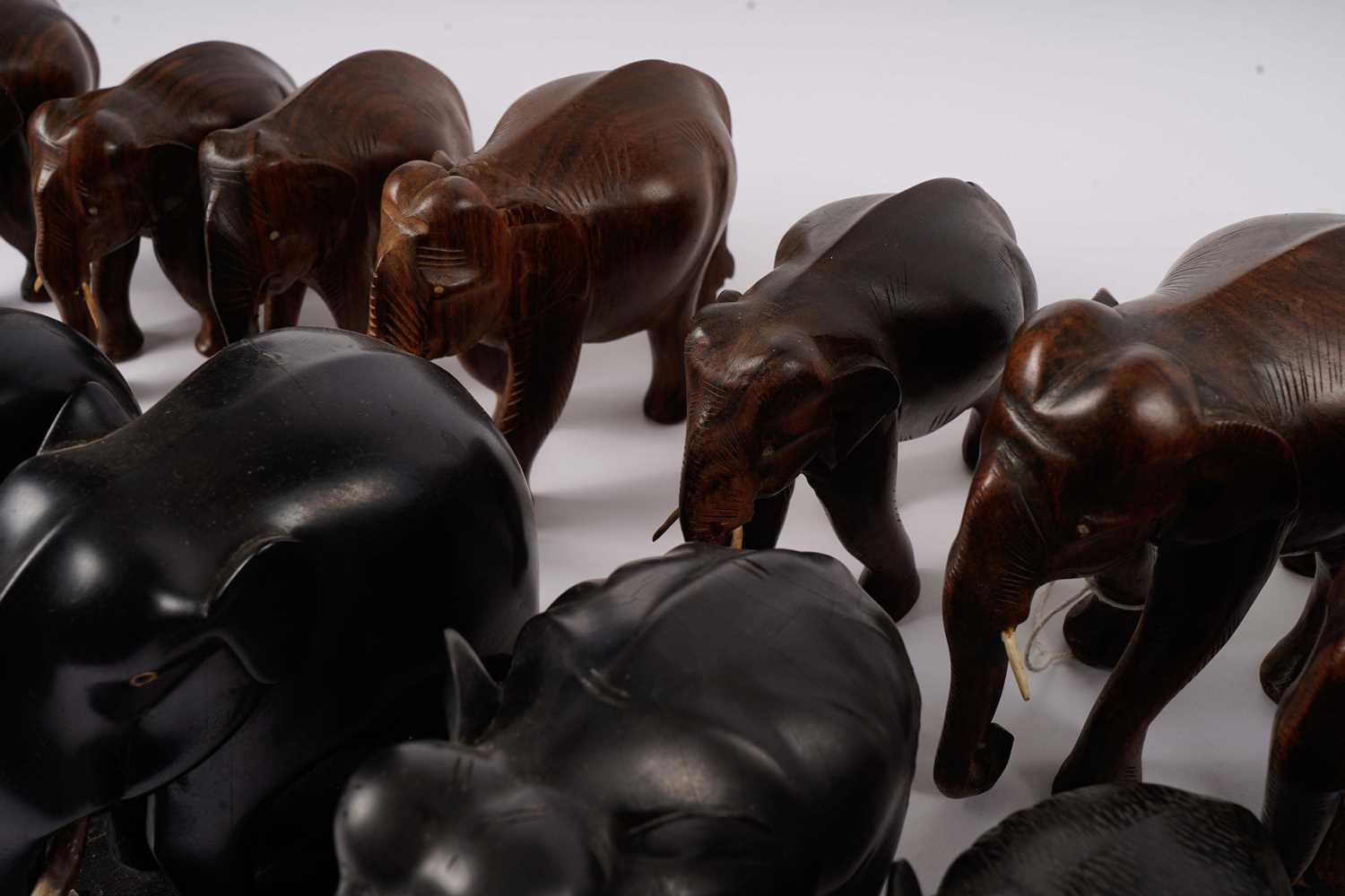 A collection of Asian carved hard wood elephant figures - Image 2 of 3