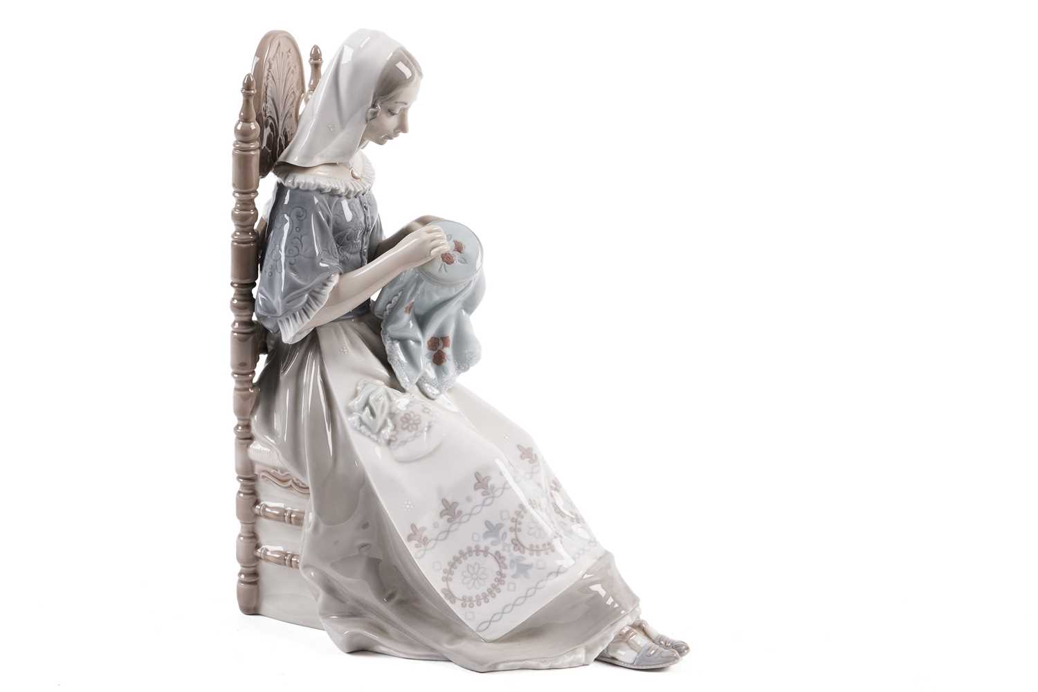 Lladro figurine of an embroiderer