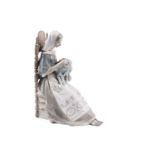 Lladro figurine of an embroiderer