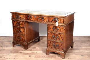 A Victorian style mahogany pedestal desk