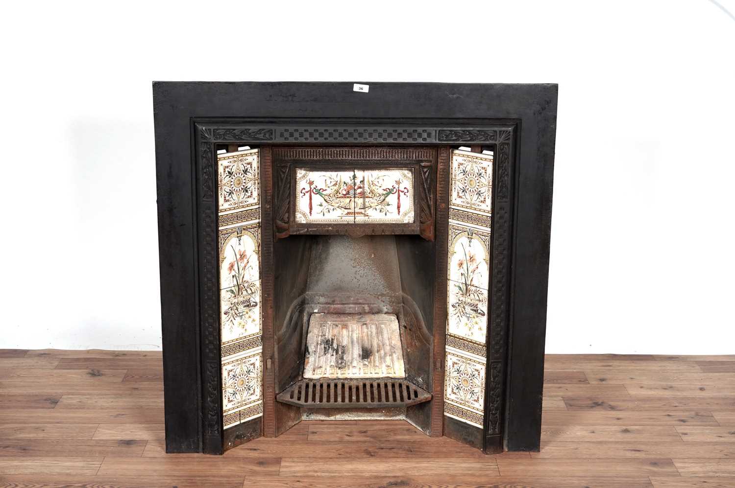 A Victorian cast iron fireplace