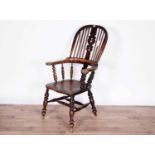 A 19th Century stained-oak and elm bow-back Windsor chair