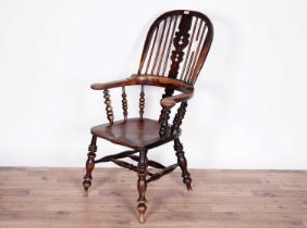 A 19th Century stained-oak and elm bow-back Windsor chair