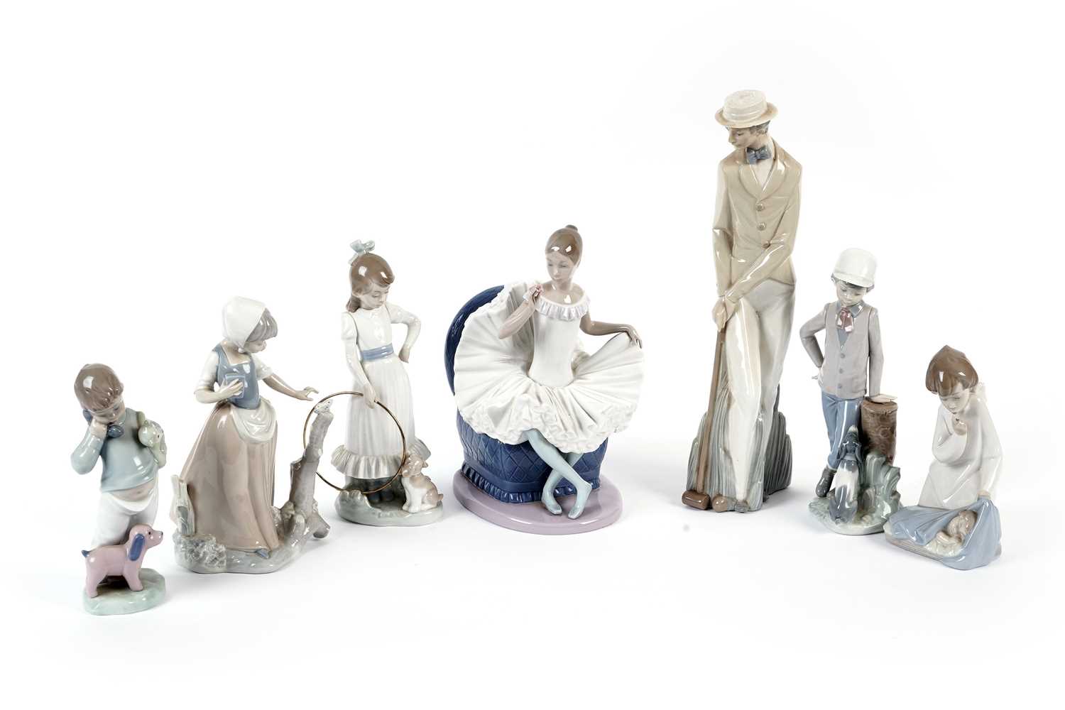 A selection of Lladro and Nao figures