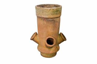 A stone composite chimney pot