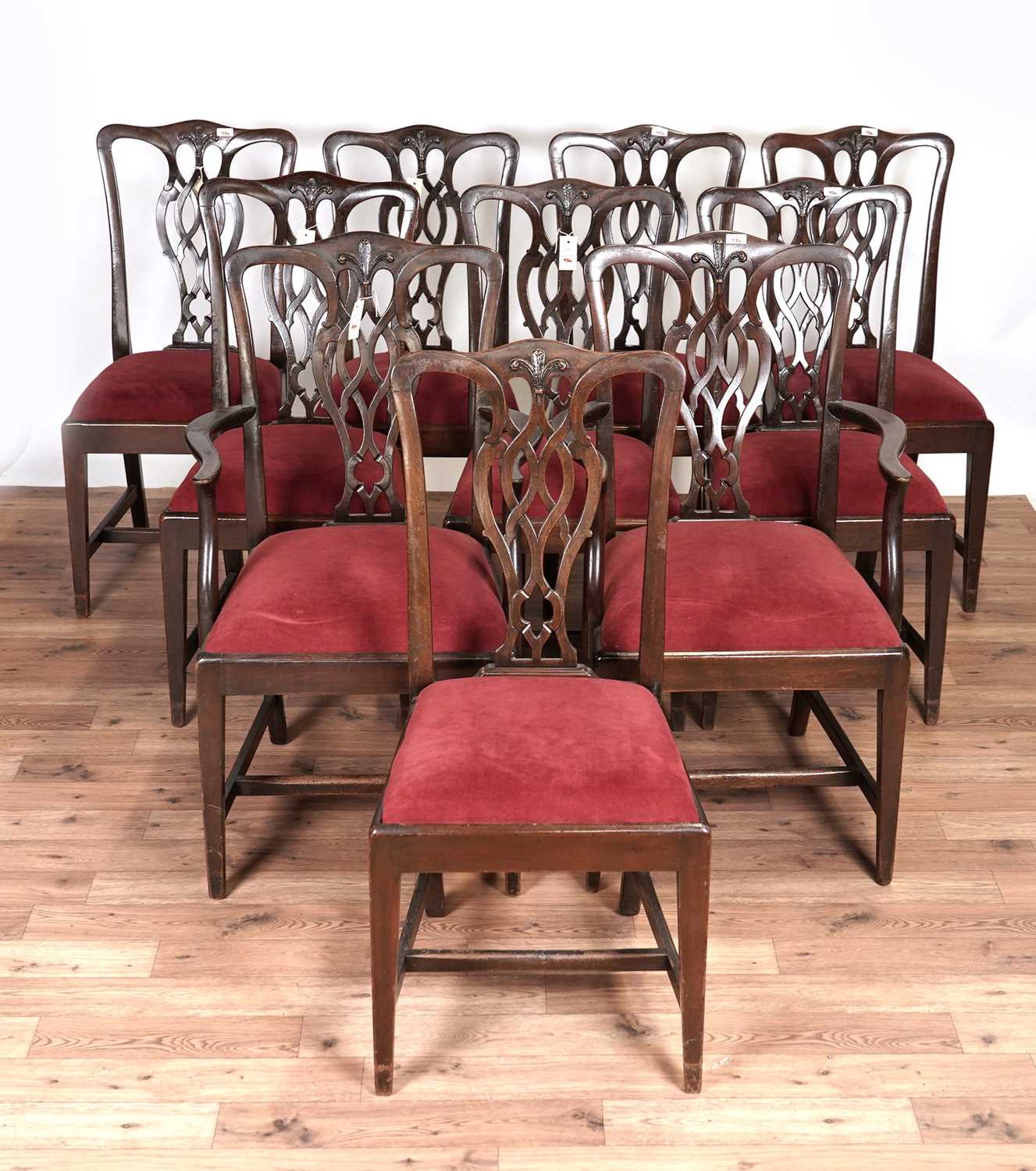 A set of ten George III style mahogany dining chairs