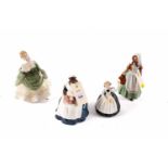 A collection of decorative Royal Doulton figures