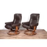 Ekornes: A pair of leather reclining armchairs