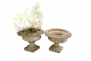 Two stone composite garden urns