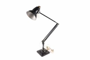 A vintage black painted angle poised lamp