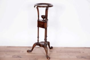 A mid 18th Century style mahogany wig stand