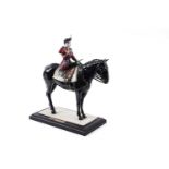 A Coalport Royal Commemorative 'Trooping the Colour' figure of Queen Elizabeth II