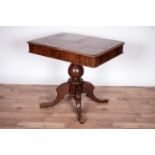An early 20th Century walnut extending table