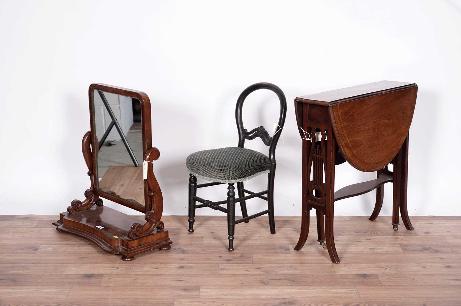 A Victorian toilet mirror, an Edwardian Sutherland occasional table and a Victorian child's chair