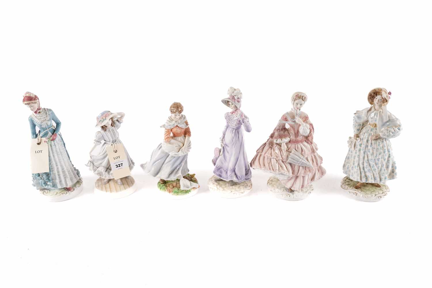 A collection of Royal Worcester ceramic figures of ladies