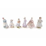 A collection of Royal Worcester ceramic figures of ladies