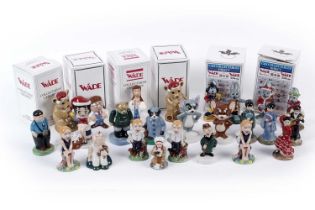 A collection of Wade ceramic figures