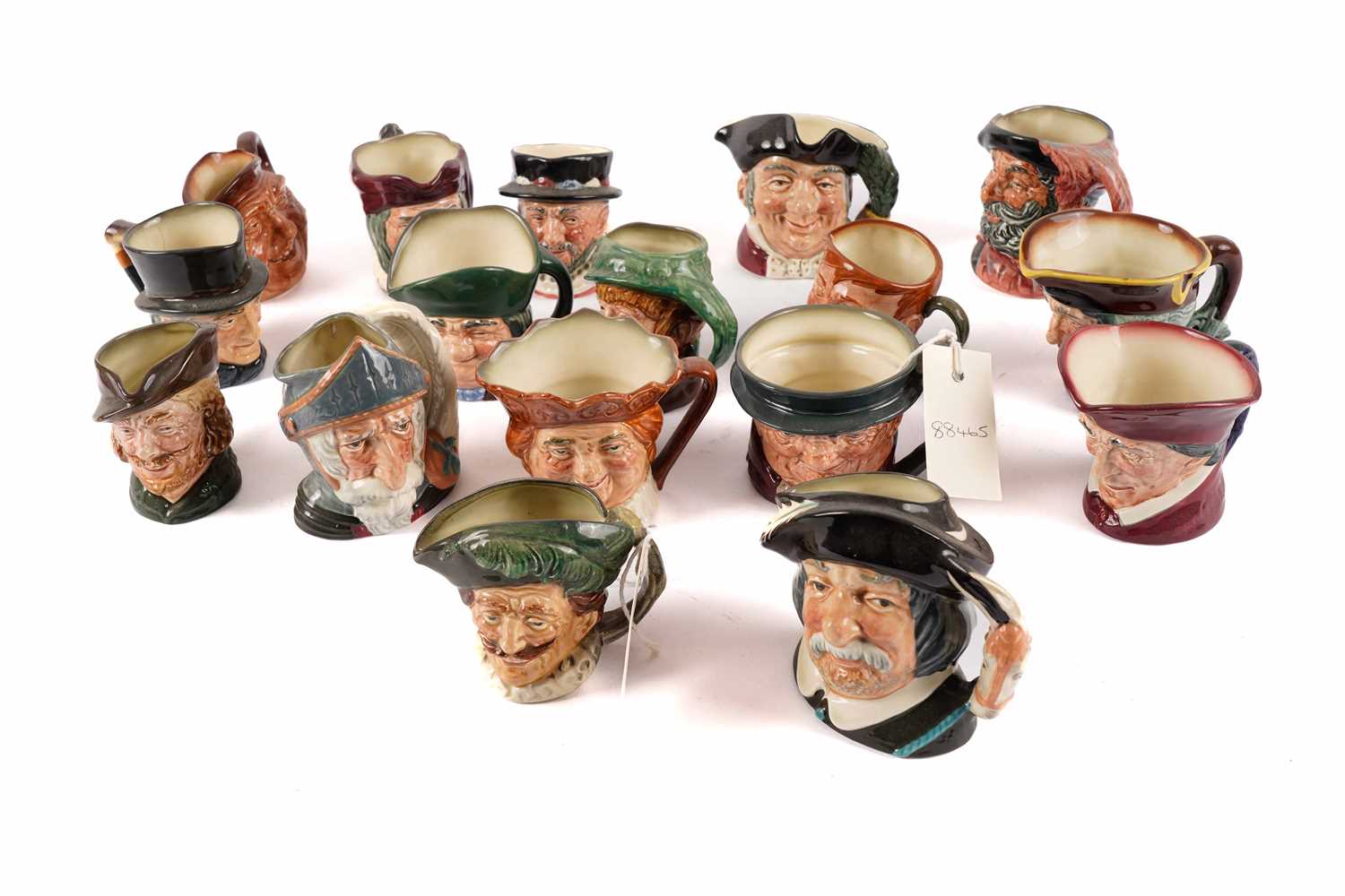 A collection of Royal Doulton Toby jugs