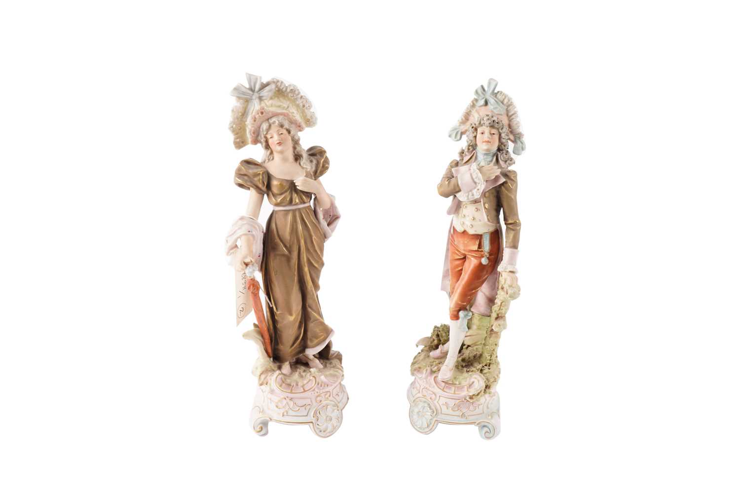 A pair of Royal Dux porcelain figures