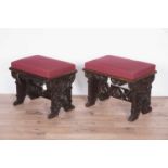 Two decorative Victorian carved oak stools,