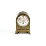 An early 20th Century green japanned mantle clock