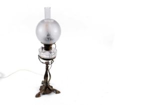 A Victorian Art Nouveau brass oil lamp