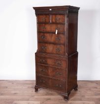 A Georgian-style mahogany chest-on-chest