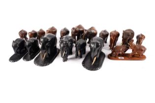 A collection of Asian carved hard wood elephant figures