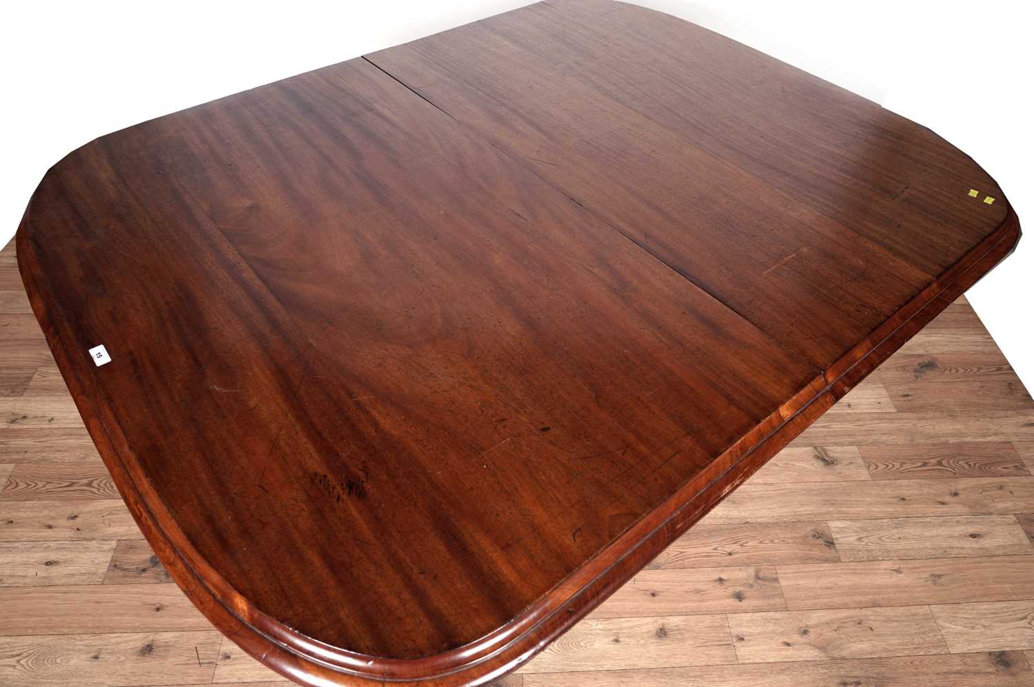 A Victorian mahogany extending dining table - Image 3 of 12