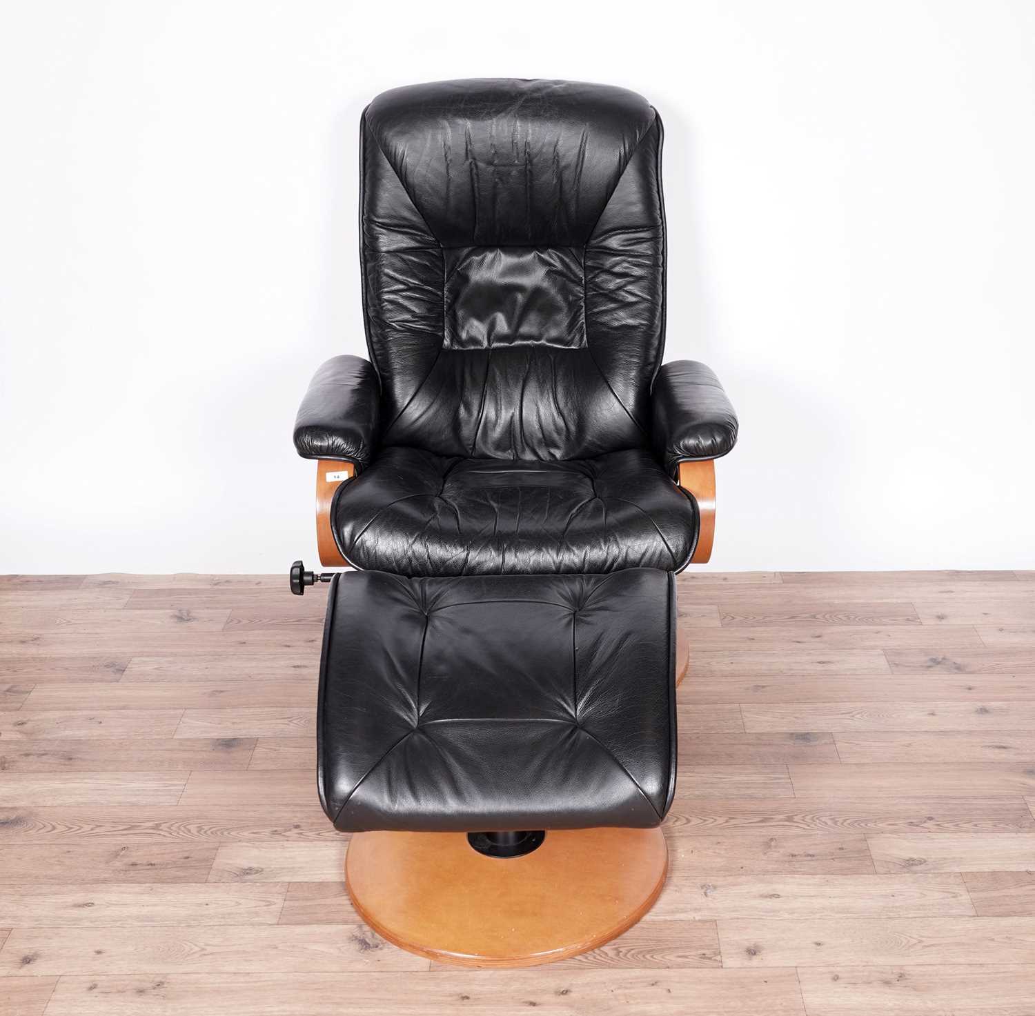 A black leather reclining armchair and stool by ChairWorks - Image 3 of 5