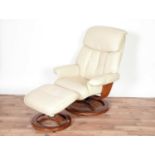 A leather reclining armchair with matching footstool by Global Furniture Alliance