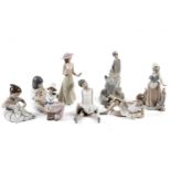Eight assorted Nao figurines
