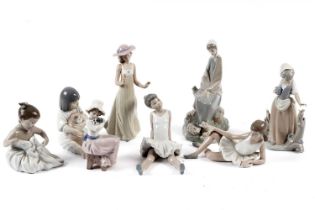 Eight assorted Nao figurines