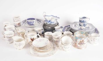 A collection of decorative ceramics, including blue and white, commemorative and other