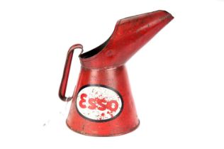 An Esso red petrol can