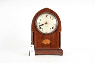 A mahogany mantle clock