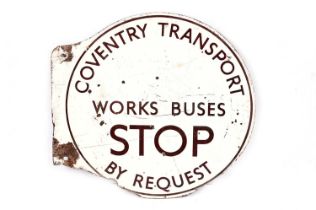 A double-sided enamel transport sign