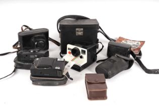 A selection of vintage cameras and cases; and other items