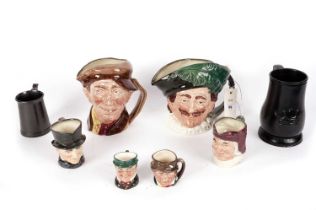 A collection of Royal Doulton toby character jugs