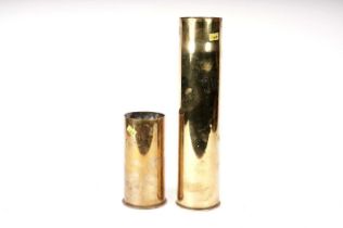Eleven brass shell cases