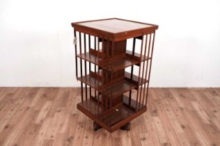 An early 20th Century mahogany three tier revolving bookcase