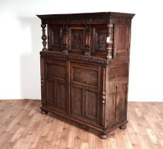 A 17th Century style oak court cupboard