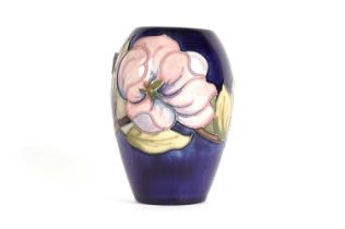 A Moorcroft ‘Magnolia’ pattern vase