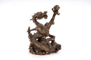 A Chinese bronze figure of a dragon