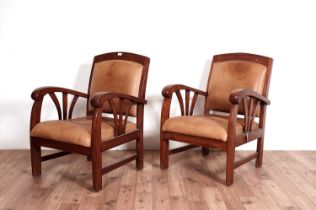 A pair of Art Deco style hardwood armchairs