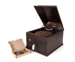 A mid 20th Century gramophone; and two tins of Songster pick-up needles