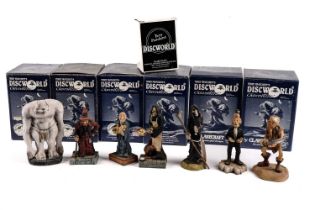 A collection of Terry Pratchett Discworld figures