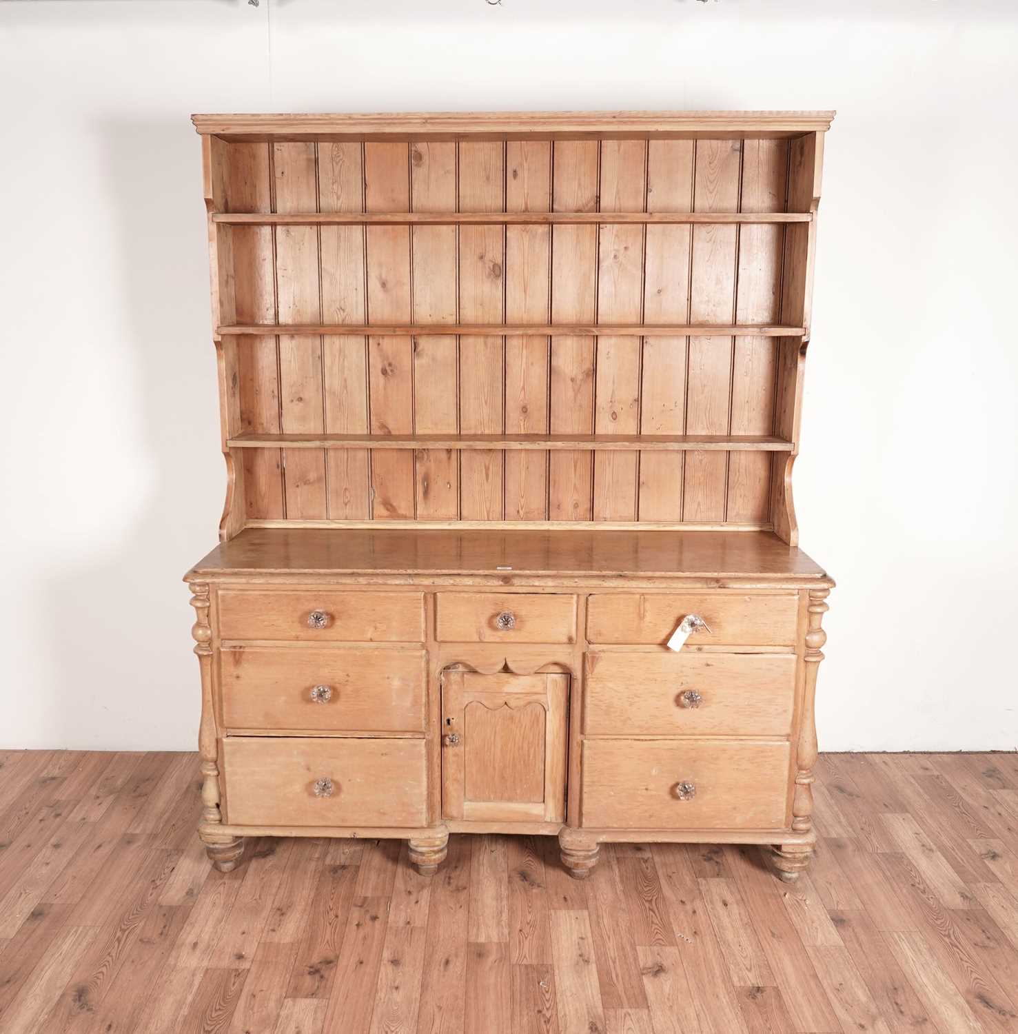 A Victorian stripped pine dresser