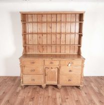 A Victorian stripped pine dresser